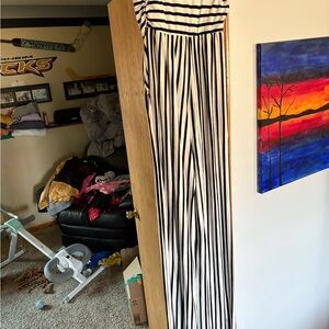 Chic Black and White Striped Jumpsuit with Flowing Design